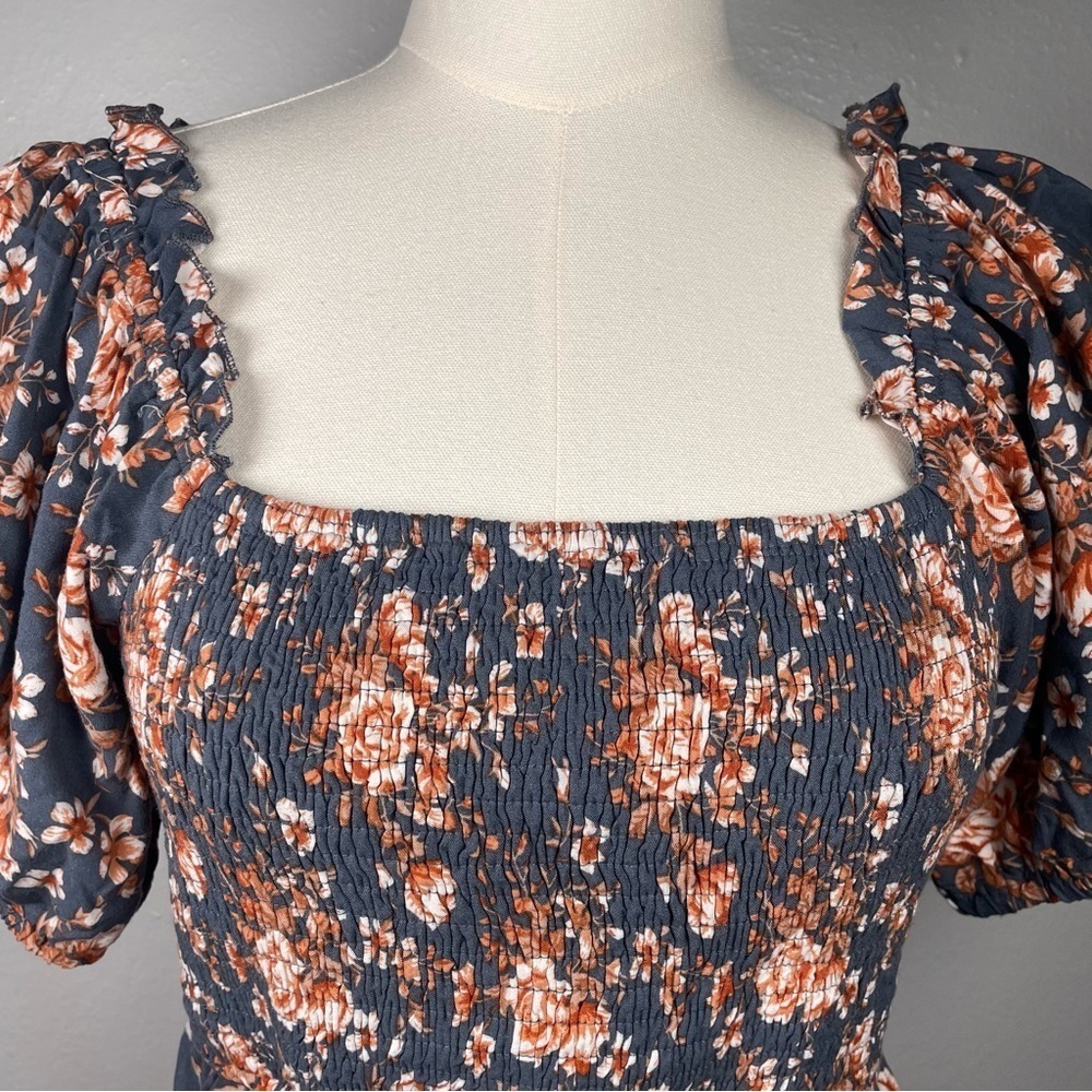 Blue Floral Smocked Babydoll Top by Listicle Size M
Puffed Sleeves Vintage Vibes - Picture 10 of 12